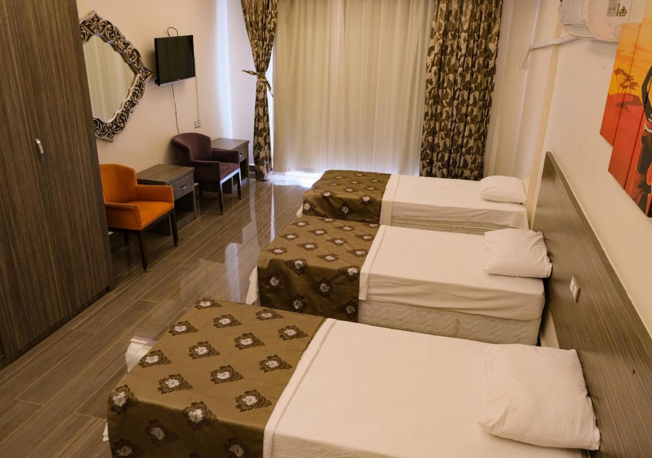 Truva Life Hotel Samandag Extérieur photo